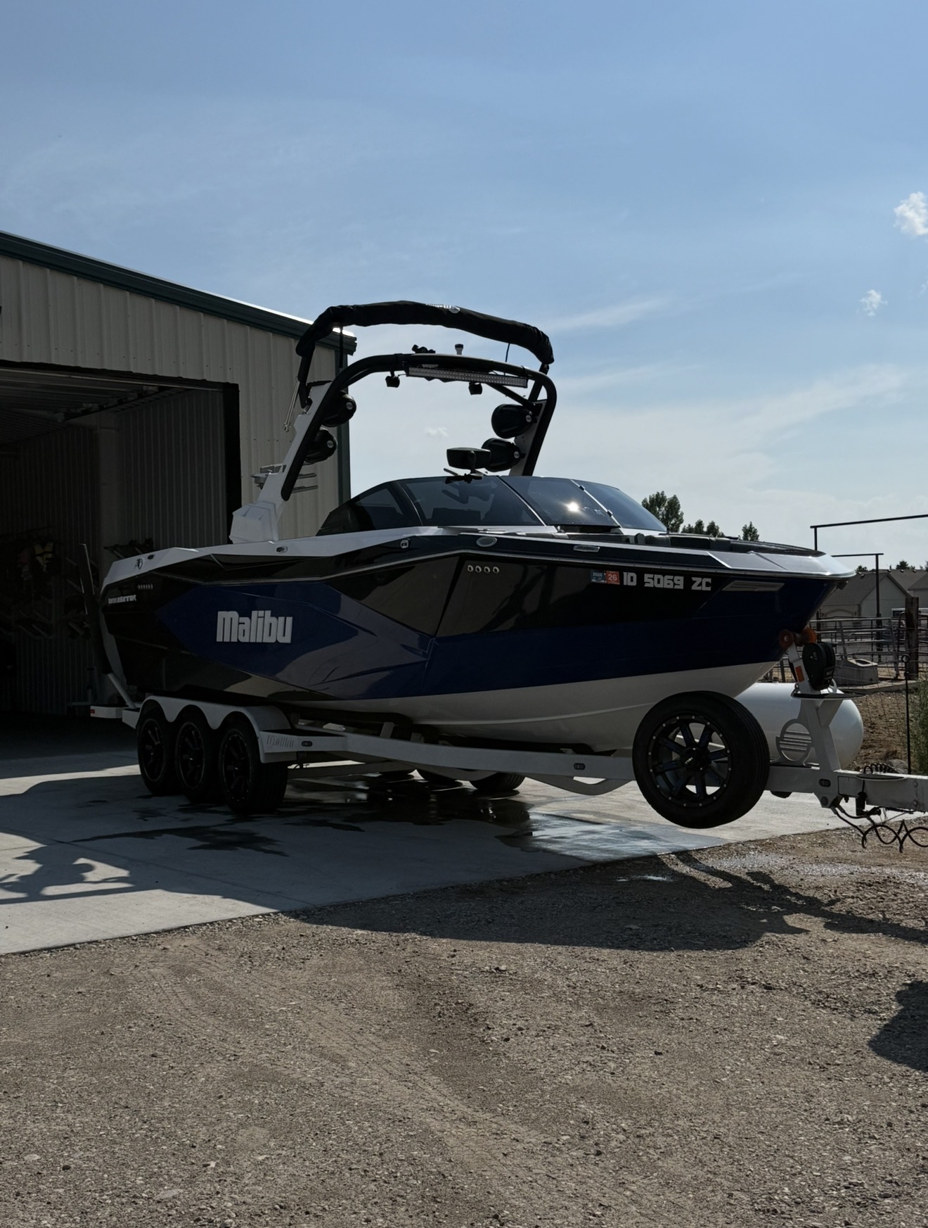 Malibu wakesetter boat freshly detailed on its trailer