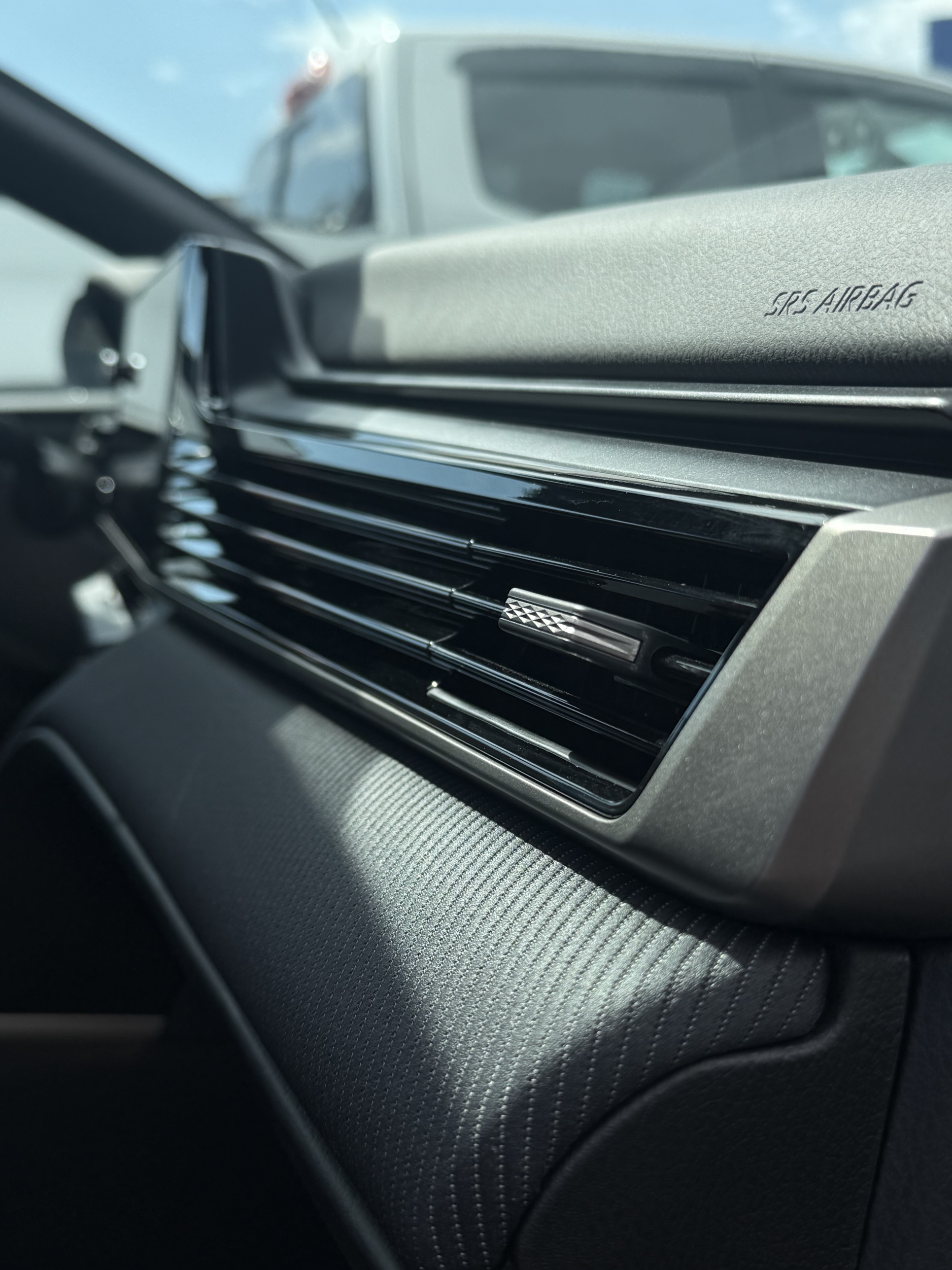 Close-up of a detailed dashboard air vent after an interior detail