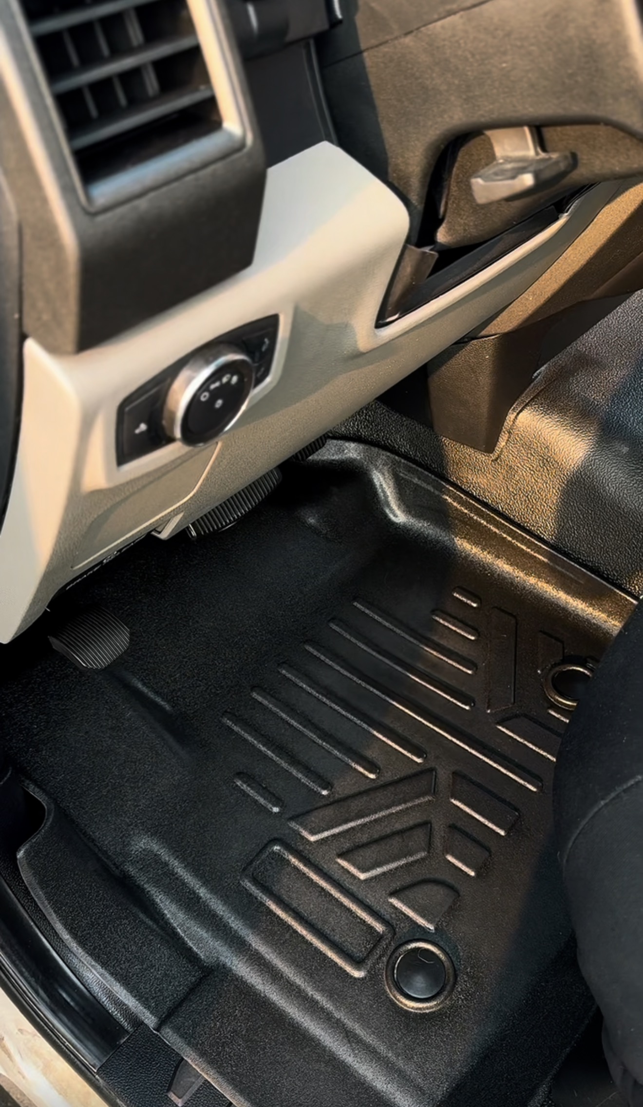 Clean Ford truck driver-side floor mat after a mobile interior detail