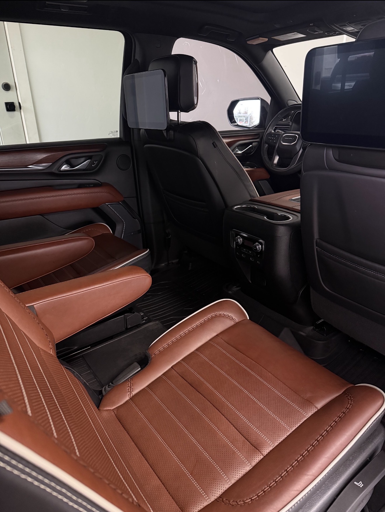 GMC Denali rear captain's chairs after an interior detail