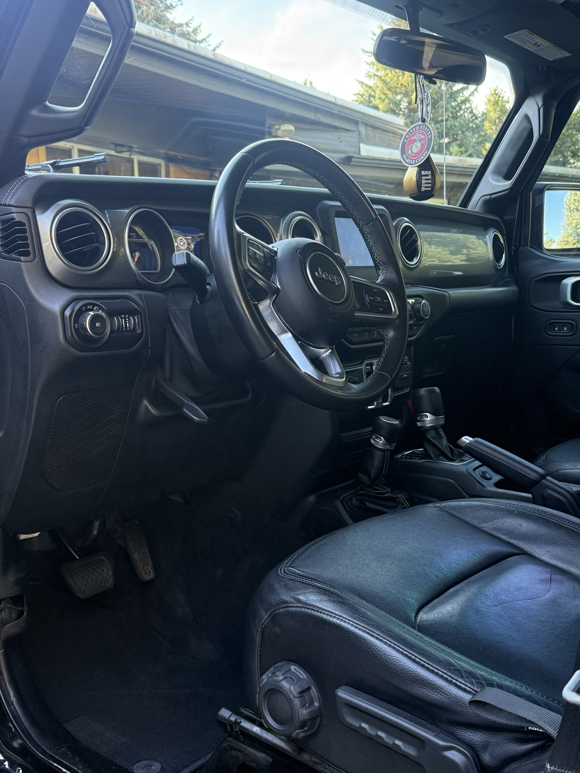 Jeep Wrangler dashboard and steering wheel after an interior detail