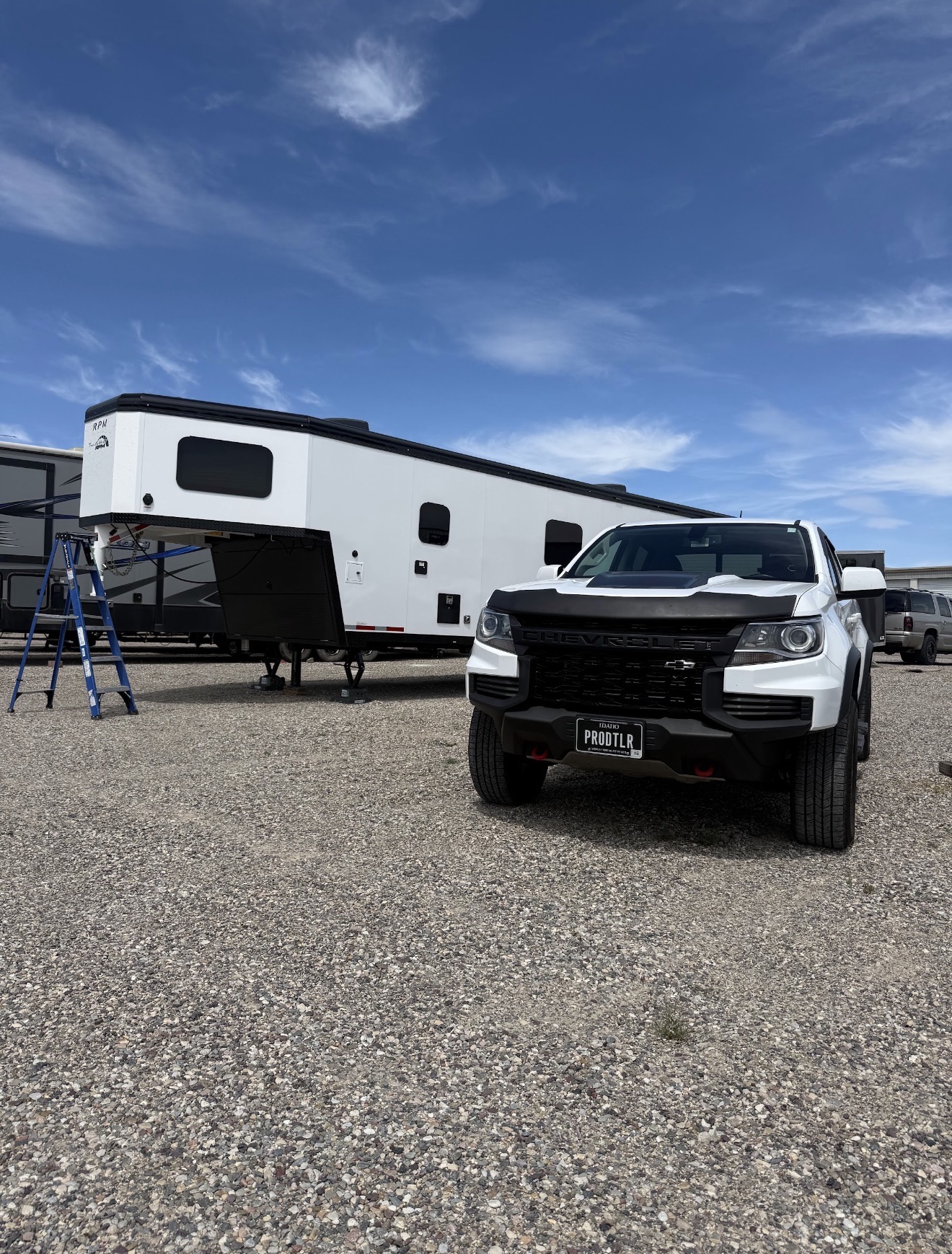 Toy hauler RV and Chevrolet truck after a mobile detail